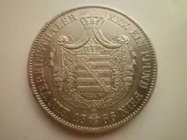 1_taler_1866_goda_saksen_vejmar_ejzenakh_redkij_otlichnoe_sostojanie_krasivaja_legkaja_patina.webp