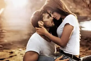 depositphotos_180200248-stock-photo-handsome-man-hugging-his-sensual.webp