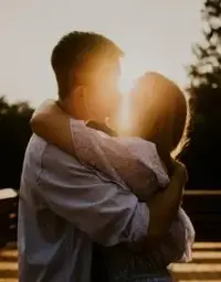 couple-hugging-and-kissing.webp