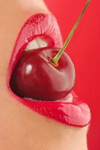 depositphotos_28990677-stock-photo-red-lips-with-cherry-on.webp