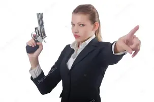 depositphotos_34845125-stock-photo-woman-businesswoman-with-gun-on.webp