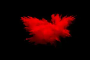 abstract-red-dust-explosion-on-black-background_36326-177.webp