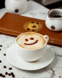 cappuccino-with-cinnamon-drawing-on-top_140725-3356.webp