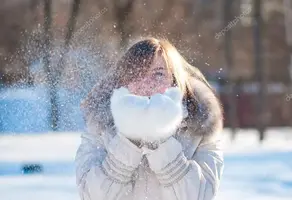 depositphotos_22851446-stock-photo-beautiful-woman-blowing-in-the.webp