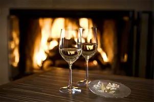 champagne-drink-fire-fireplace-Favim.com-2365524.webp